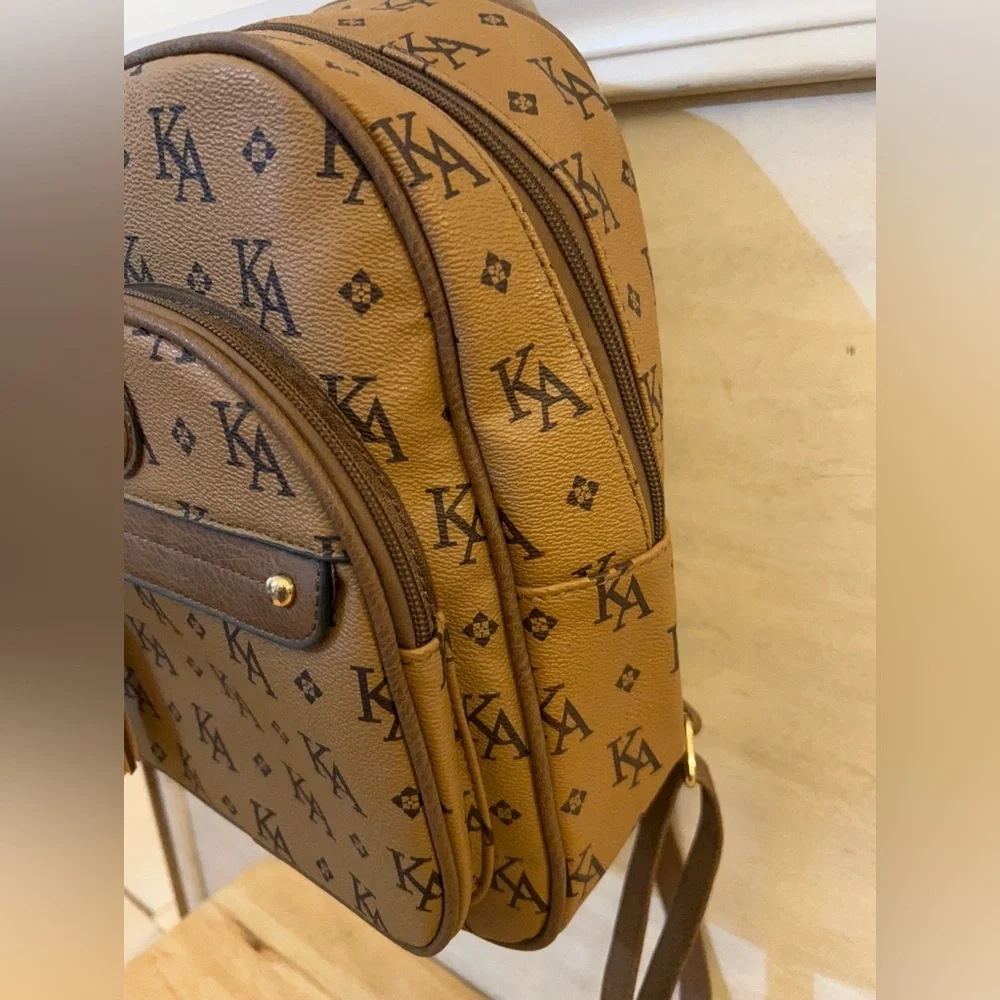 KA Monogram Backpack in Tan 100% polyurethane